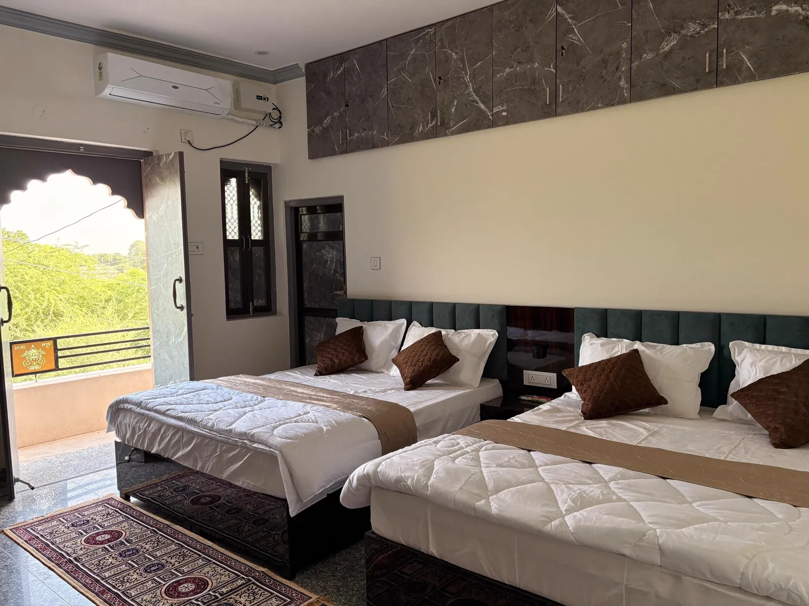Bright and airy AC room with balcony window view at The Jawai Niwas, Sumerpur Pali