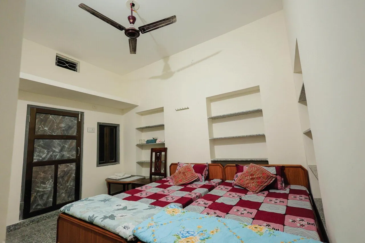 Deluxe Non-AC Room with twin single beds at The Jawai Niwas near Jawai Bandh station