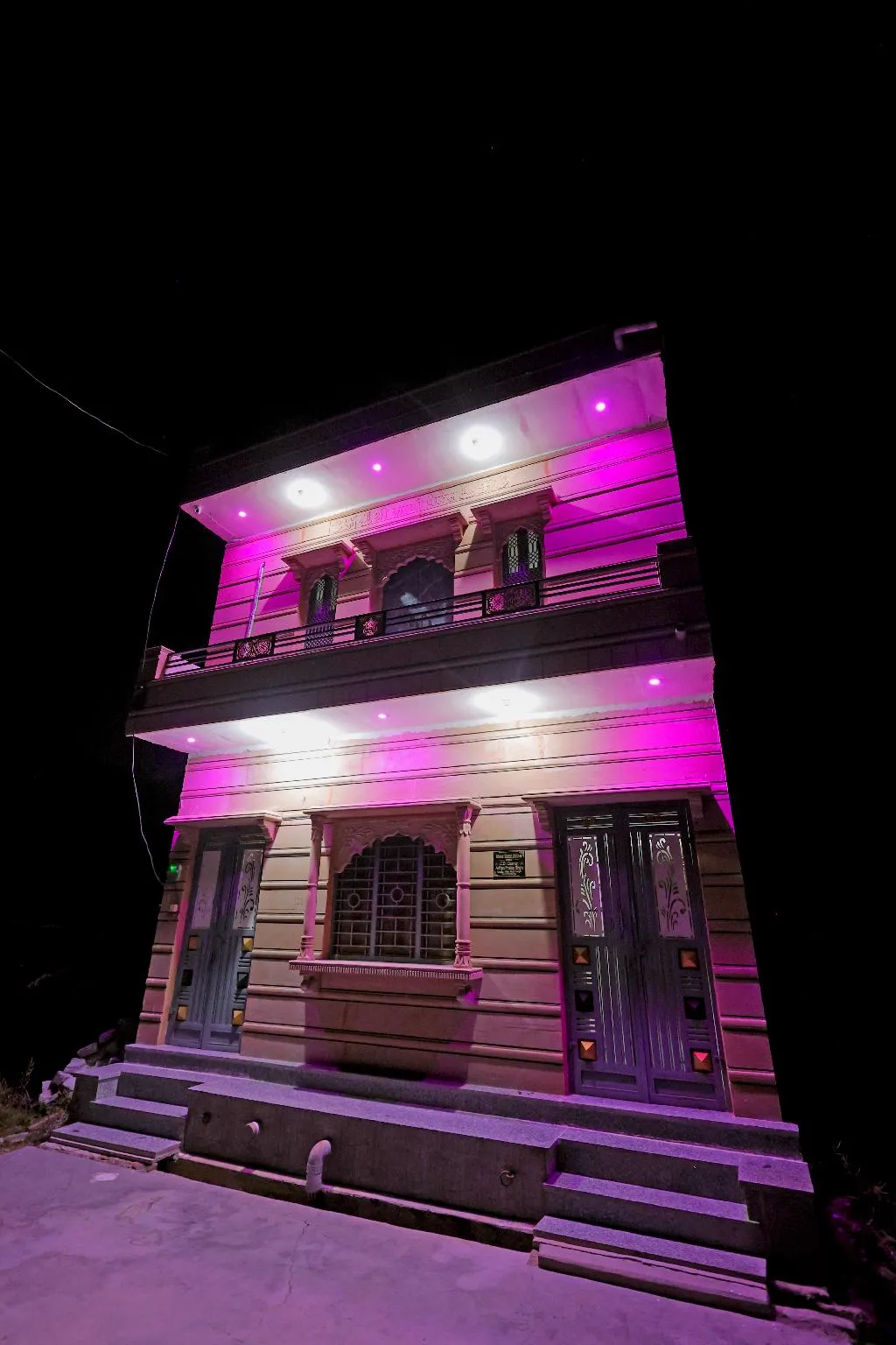 The Jawai Niwas building exterior illuminated beautifully at night in Sumerpur, Rajasthan